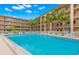 Large community pool with plenty of space to lounge and relax by the water at 2525 W Bay Dr # A20, Belleair Bluffs, FL 33770