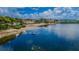 Scenic waterfront aerial view with beachfront and moored boats at 2700 Bayshore Blvd # 547, Dunedin, FL 34698