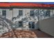 Patio view with sliding glass doors and windows of the townhome's rear exterior at 2700 Bayshore Blvd # 547, Dunedin, FL 34698