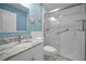 Modern bathroom with marble countertops and a glass-enclosed shower at 2700 Bayshore Blvd # 547, Dunedin, FL 34698