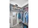 Well-organized walk-in closet featuring built-in shelving and a variety of storage options at 2700 Bayshore Blvd # 547, Dunedin, FL 34698