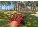 Scenic community park with picnic tables and decorative bridge at 2700 Bayshore Blvd # 547, Dunedin, FL 34698