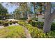 Lush landscaping welcomes you into this community with a charming entrance and building beyond at 2700 Bayshore Blvd # 547, Dunedin, FL 34698
