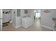 Open laundry area leading to other rooms, featuring modern washing machine and dryer at 2700 Bayshore Blvd # 547, Dunedin, FL 34698