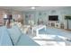 Inviting living room with beachy decor, comfortable seating, and ample natural light at 2700 Bayshore Blvd # 547, Dunedin, FL 34698