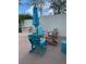 Enjoy this patio area with plenty of outdoor seating, including Adirondack chairs and side tables at 2700 Bayshore Blvd # 547, Dunedin, FL 34698