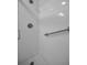 Clean and modern shower with accessible grab bar, chrome shower head, and spotless surfaces at 2700 Bayshore Blvd # 547, Dunedin, FL 34698