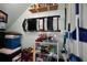 Storage room with shelving, cleaning supplies, and organizational equipment at 2700 Bayshore Blvd # 547, Dunedin, FL 34698