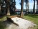 Horseshoe pit with lakeside views provides a relaxing recreational activity at 2735 Sherbrooke Ln # D, Palm Harbor, FL 34684