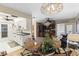 Open concept living room flowing from the kitchen and into a spacious area with natural lighting at 2735 Sherbrooke Ln # D, Palm Harbor, FL 34684