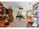 Comfortable living room with hardwood floors, ceiling fan and open floor plan at 2735 Sherbrooke Ln # D, Palm Harbor, FL 34684