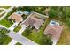 An aerial shot shows surrounding homes with pools and well manicured yards at 3004 Spring Hammock Dr, Plant City, FL 33566