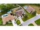 Aerial view of the property, highlighting its location within a residential neighborhood with mature trees and landscaping at 3004 Spring Hammock Dr, Plant City, FL 33566