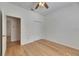 Bedroom features wood floors, a closet, and white walls, ready for your personal touch at 3004 Spring Hammock Dr, Plant City, FL 33566