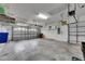 Spacious two-car garage offering ample storage space and organization at 3004 Spring Hammock Dr, Plant City, FL 33566