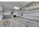 A spacious garage area that offers lots of room for vehicles, storage, and projects at 3004 Spring Hammock Dr, Plant City, FL 33566
