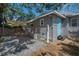 Backyard featuring gray siding, an outdoor shower, and a brick-paver patio at 302 W Hilda St, Tampa, FL 33603