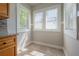 Bright breakfast nook with multiple windows providing ample natural light at 302 W Hilda St, Tampa, FL 33603