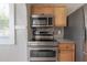 Close up of kitchen appliances and cabinets at 302 W Hilda St, Tampa, FL 33603