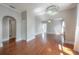 Bright, open living room with beautiful hardwood floors and abundant natural light at 302 W Hilda St, Tampa, FL 33603