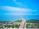 Breathtaking aerial view captures the grandeur of the bridge and the sprawling waterfront landscape at 3087 Cherry Ln, Clearwater, FL 33759