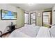 Comfortable bedroom with en-suite bathroom and walk-in closet offering convenience and privacy at 3087 Cherry Ln, Clearwater, FL 33759