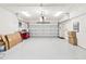 Spacious and bright garage space with a large door and ample room for parking and storage at 3087 Cherry Ln, Clearwater, FL 33759