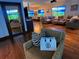 Cozy living space with stylish decor, comfortable seating, and a view of the dining area at 3087 Cherry Ln, Clearwater, FL 33759