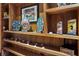 Wooden shelves displaying trophies, memorabilia and other decorative items at 3087 Cherry Ln, Clearwater, FL 33759