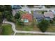 A captivating aerial view shows the home's layout, private pool and landscaping in its residential neighborhood at 3092 Hillside Ln, Safety Harbor, FL 34695