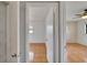 Hallway view of the bedroom with natural light at 3092 Hillside Ln, Safety Harbor, FL 34695