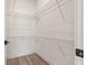 Spacious walk-in closet with multiple wire shelves for optimal storage at 3505 N Dartmouth Ave, Tampa, FL 33603