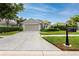 Inviting single-Gathering home with a well-manicured lawn and a paved driveway at 3726 Rain Tree Ct, Palm Harbor, FL 34685