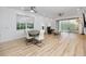 Spacious living room with sliding glass doors leading to outdoor patio at 3726 Rain Tree Ct, Palm Harbor, FL 34685