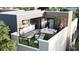Rooftop patio features a hot tub, lounge chairs, a grill, an outdoor shower, and scenic views at 4723 W Price Ave # 2, Tampa, FL 33611