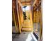 Interior staircase under construction with visible wooden framing and stairs leading to an upper level at 4723 W Price Ave # 2, Tampa, FL 33611