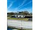 Scenic view from a rooftop showcasing a neighborhood, distant buildings, and a partly cloudy sky at 4723 W Price Ave # 2, Tampa, FL 33611