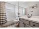 Bright bathroom featuring a tub, shower and neutral color palette, creating a clean and inviting space at 5116 Gato Del Sol Cir, Wesley Chapel, FL 33544
