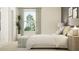 Bright bedroom featuring a large bed, a window, and bedside tables at 6849 E 115Th St, Palmetto, FL 34221