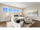 Comfortable bedroom with natural light, neutral colors, plush bedding, and stylish seating area at 804 S Davis Blvd, Tampa, FL 33606