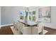 Bright dining room featuring a large table, modern chairs, recessed lighting, and big windows at 804 S Davis Blvd, Tampa, FL 33606