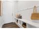 Inviting entryway with custom built-in bench and storage cubbies at 804 S Davis Blvd, Tampa, FL 33606