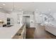 Bright, open kitchen with a large island, modern appliances, and seamless flow to the staircase at 804 S Davis Blvd, Tampa, FL 33606