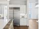 Contemporary kitchen featuring a stainless steel refrigerator, modern cabinets, and an open layout at 804 S Davis Blvd, Tampa, FL 33606