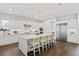 Spacious kitchen with a large island, seating, top-of-the-line stainless steel appliances, and plenty of counter space at 804 S Davis Blvd, Tampa, FL 33606