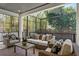 Covered patio with comfortable seating, offering a relaxing outdoor living experience at 804 S Davis Blvd, Tampa, FL 33606