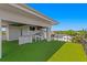 Enjoy a rooftop terrace with an outdoor kitchen, artificial turf, and city views at 804 S Davis Blvd, Tampa, FL 33606
