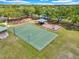 Aerial view of the community playground with basketball court, picnic pavilion and play area at 8202 Pinewood Run Ct, Tampa, FL 33647