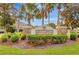 Entrance to the Seminole Palms community featuring lush landscaping and welcoming signage at 8796 Christie Dr, Largo, FL 33771