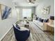 Bright living room featuring neutral tones, stylish decor and modern furnishings at 8796 Christie Dr, Largo, FL 33771